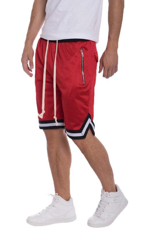 Striped band solid basketball shorts with zippered pockets and contrast stripe.